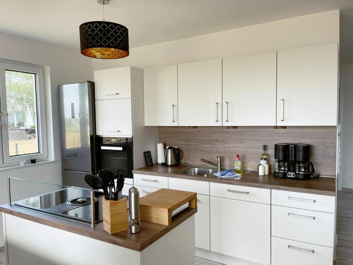 Exklusives Apartment Mit Blick Auf Den See Grossraeschen Dış mekan fotoğraf